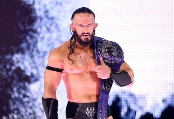 Benjamin Satterley posing with the WWE Cruiserweight Championship